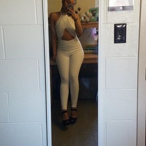 All white Jumpsuit, open back